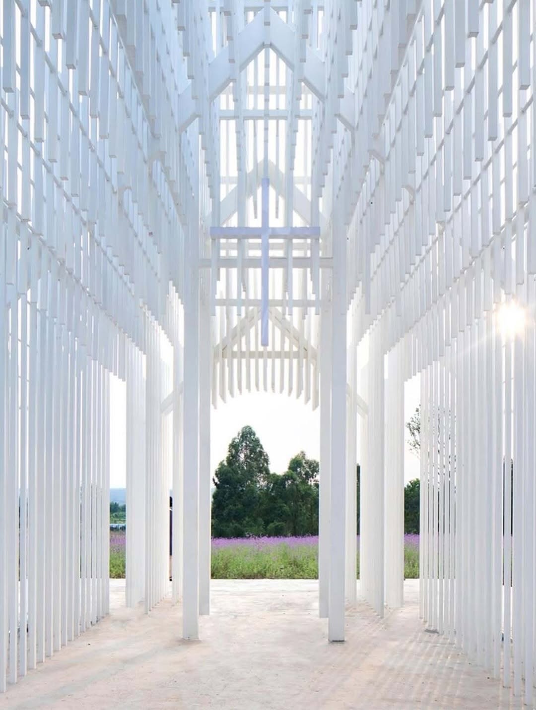 Shadowless Church structure glowing in changing daylight