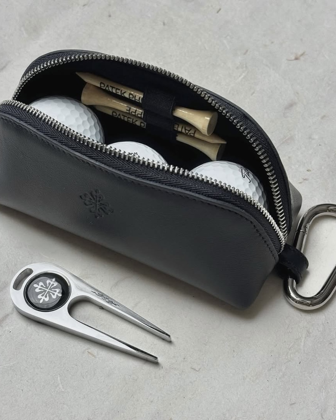 Patek Philippe golf set in blue leather zip pouch with Calatrava Cross