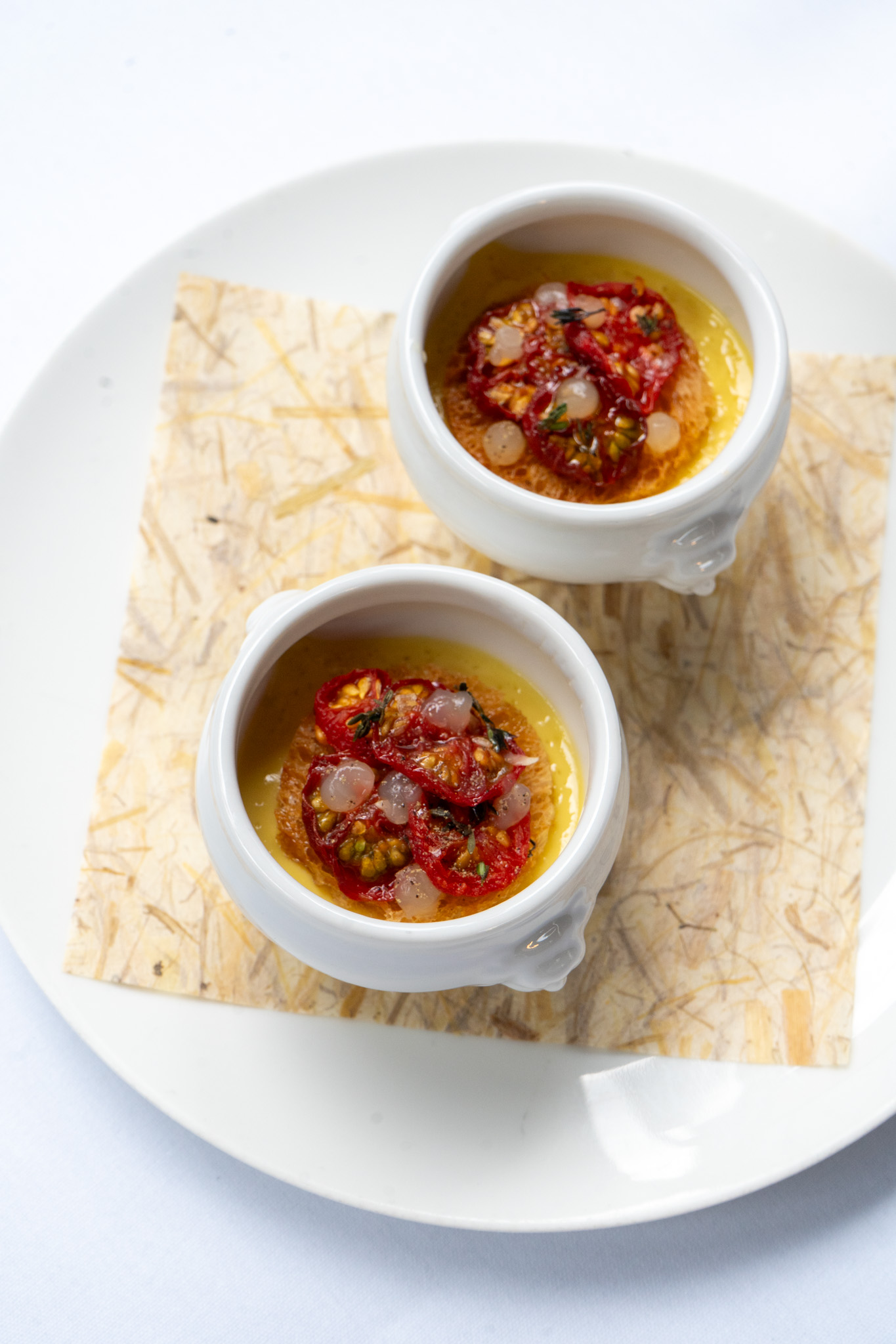 Close-up of culinary dish highlighting textures and local produce