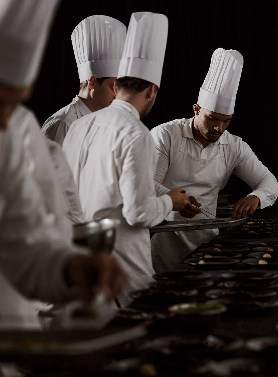 Chef Francis Blais preparing dishes during In Praise of Shadows service
